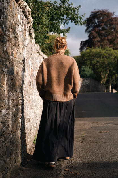 Maree knit is made with the finest Scottish spun lambswool. Knitted in a chunky luxurious 4 ply yarn with a funnel neck, contrast cuffs and a boxy, oversize fit. Traditionally made with fully fashioned knitting techniques and linked together by hand. Crafted within 80 miles of our design studio in the Scottish Borders.